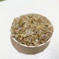 Cristaux de quartz jaune naturels pour bijoux et décoration dans un bol blanc - Quartz Rutilé Jaune