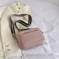 Pink minimalist crossbody bag with lychee texture and striped wide fabric shoulder strap - Pink