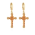 Dettaglio di orecchini a cerchio a croce placcati oro 18 carati con zirconi arancioni - Arancione