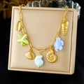 Collar de cadena dorada con colgantes de concha, estrella de mar, tortuga y caracola - Estilo de Tema Oceánico con Múltiples Colgantes (Estrella de Mar, Tortuga, Concha) (N3693)