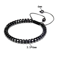 Adjustable black hematite cylinder beaded bracelet with 3.5x6mm stones and woven cord - 6x4mm Flat Bead