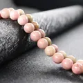 Polished redwood grain jasper round beads with natural pink and brown marble texture - Red Wood Grain Stone
