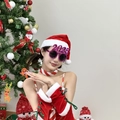 Purple glittery 2025 glasses with Christmas velvet outfit and festive party decorations - Rose Red Connected 2025 Glasses