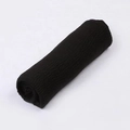 Rolled black bali gauze scarf with textured ribs and soft fringed edges on white background - Black