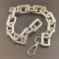 Thick silver rectangular link chain accessory with swivel lobster clasp on dark background - Silver Square Chain