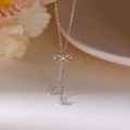 Elegant S925 sterling silver bow necklace with tassel pendants and sparkling zircon details - White Gold