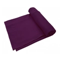 Close-up of dark purple milk silk fabric showing soft texture and neat hemmed edges - Purple