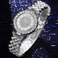 Macro detail of luxury silver watch featuring diamond bezel and rhinestone woven strap - Silver Watch (Single)