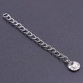 Silver metal necklace extender chain with textured round tag on dark background - S1655 Patterned Round Tag / Silver