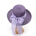 Close-up of deep purple straw sun hat featuring a large lavender linen bow detail - M (56-58cm) / Purple