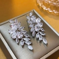 Silver leaf-shaped earrings with drop-cut zircon tassels on a premium jewelry box - Zircon Leaf Tassel Pendant (HE12037) / Silver
