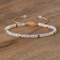 Adjustable hand-woven bracelet with milky white square beads and gold metal spacers - No.24 Opalite
