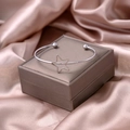 Minimalist silver open cuff bracelet with hollow star detail and gift box display - Silver Star Style