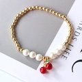 Gold-plated pearl bracelet with bright red cherry pendant for women and girls - Style 1 (Cherry)
