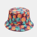 Detailed close-up of vibrant red sun hat featuring an all-over tropical pineapple print - M(56-58cm) / Red Pineapple Print
