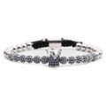 Close-up of crown braided bracelet with blue cubic zirconia and silver micro-pave beads - Blue Zirconia Silver Crown Bracelet
