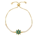 Detail of adjustable gold bracelet with green gemstone flower and white zircon accents - Green