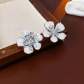 Macro detail of gradient crystal flower earrings with silver posts and rhinestones - Silver Blue
