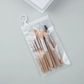 8-piece makeup brush set with light brown handles and silver ferrule in clear PVC bag - 8Pcs Macaron Nude