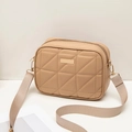 Chic beige quilted crossbody bag with golden hardware and adjustable wide fabric strap - Brown