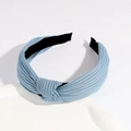Light blue knotted headband featuring textured ribbed fabric and non-slip lining - Haze Blue
