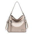 Detail view of beige hobo bag showing soft leather texture and stylish zipper tassels - Single Bag / Off-white