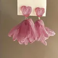 Detailed macro view of pink heart resin stud with delicate fabric flower tassel - 19# Pink Heart & Tulle Tassel (925 Sterling Silver Earring Post)