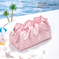 Pink satin textured cloud cosmetic bag with pearl zipper detail on white sand - Pink
