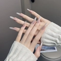 Close-up of nude gradient press-on nails in long coffin shape with glossy finish - By1732 Graceful And Charming / Glue Type