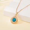 Golden necklace featuring a turquoise stone pendant surrounded by small white pearls - Pearl Surrounded Turquoise Style (137523)