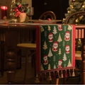 Camino de mesa navideño con jacquard de Papá Noel y borlas rojas en mesa de madera - 35x200cm / Árbol de Papá Noel Jacquard Rojo