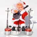 Electric Santa Claus toy playing red drums with silver base and black guitar variant - Guitar Stage Santa