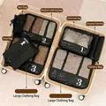 7-piece black travel organizer set with mesh breathable bags inside white suitcase - Black 8-Piece Set