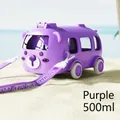 Detail of purple bear-shaped bus water bottle with adjustable strap on beach sand - PC Material / Purple Bus (500ml)