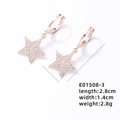 Macro view of rose gold star earrings with pave-set cubic zirconia and size details - Pentagram / Rose Gold