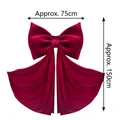 Detailed view of giant burgundy velvet bow measuring approx. 75x150cm for event decor - 75*150cm / Red