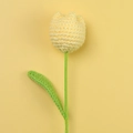 Close-up of a handmade crochet tulip in pale yellow yarn with green leaves and stem - Yellow - Large Single Stem