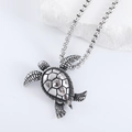 Detalle del colgante de tortuga de acero inoxidable en piedra blanca con cadena box - Con Cadena de Caja de 60cm / Color Acero