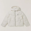 Détail de la doudoune blanche à capuche avec logo croix noire et texture imperméable - S / Blanc neige