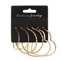 Three pairs of golden hoop earrings featuring smooth, twisted, and heart-shaped designs - 3 Pairs Set - Gold Heart (5552)