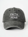 Macro view of white FAITH over FEAR 3D embroidery on washed grey cotton baseball cap - Adjustable / Black