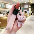 Pink French Bulldog keychain with matching leather wrist strap and golden metal ring - Pink