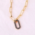 Detail of gold-plated link chain featuring a sparkling dark blue pavé oval clasp pendant - Oval Blue Zirconia Necklace