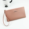 Pink faux leather long clutch wallet with wrist strap and top zipper closure - Pink