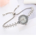 Elegante reloj de cuarzo plateado para mujer con bisel de diamantes y esfera de nácar - Plateado