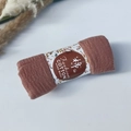 Close-up of pleated wrinkle cotton scarf in dusty rose color with paper gift band - Style #72