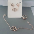 Parure de bijoux cœur entrelacé or rose avec collier et boucles d'oreilles strass - 3056