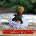 Christmas hair clip featuring a green sequined hat with gold glitter ball and tulle - Green Bow Tulle Skirt Hair Clip