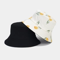 Close-up of double-sided cotton bucket hat showing floral tulip print and solid black fabric - Beige Tulip (YFM1697) / Beige