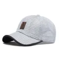 Light blue mesh baseball cap with brown leather label and dark grey brim detail - Adjustable / Light Gray